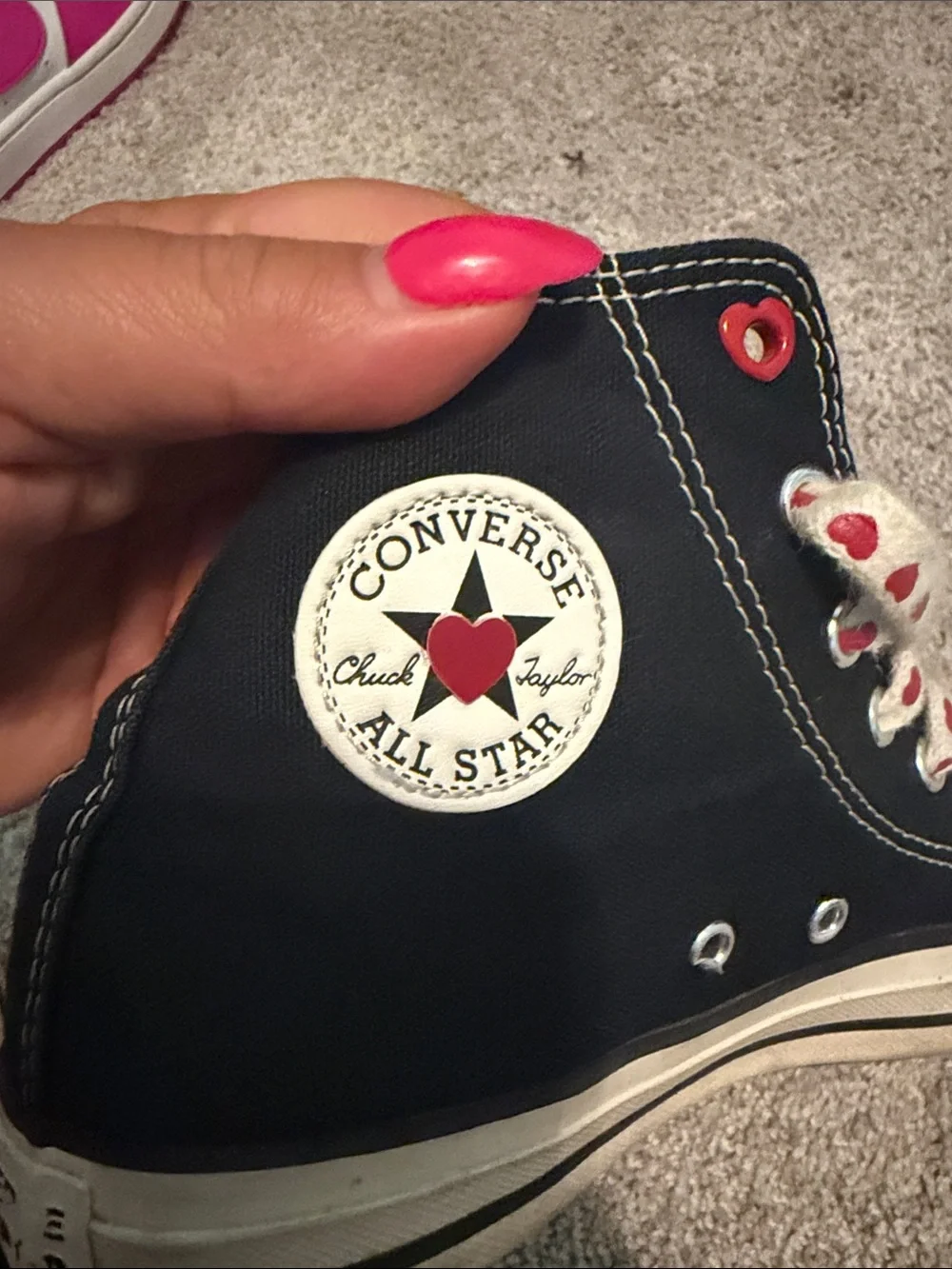 Converse Black High-Top Sneakers with Red Heart Laces